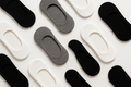 Flat lay - black, grey, white